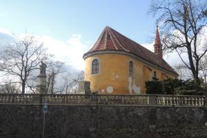 Kostel Povýšení sv. Kříže v Dobříši byl původně hradním kostelem
